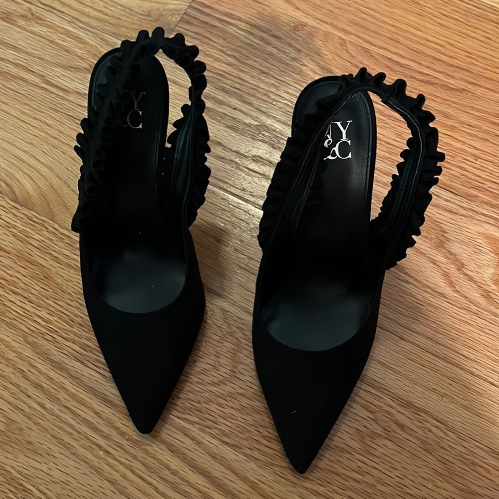 Pointed heel ruffle, sling back high heel shoe